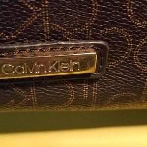 Calvin Klein purse with tag inside zipper pockets